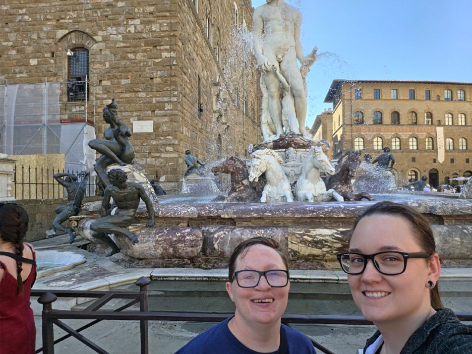 Shiloh and Jordyn by a fountain in Florence
