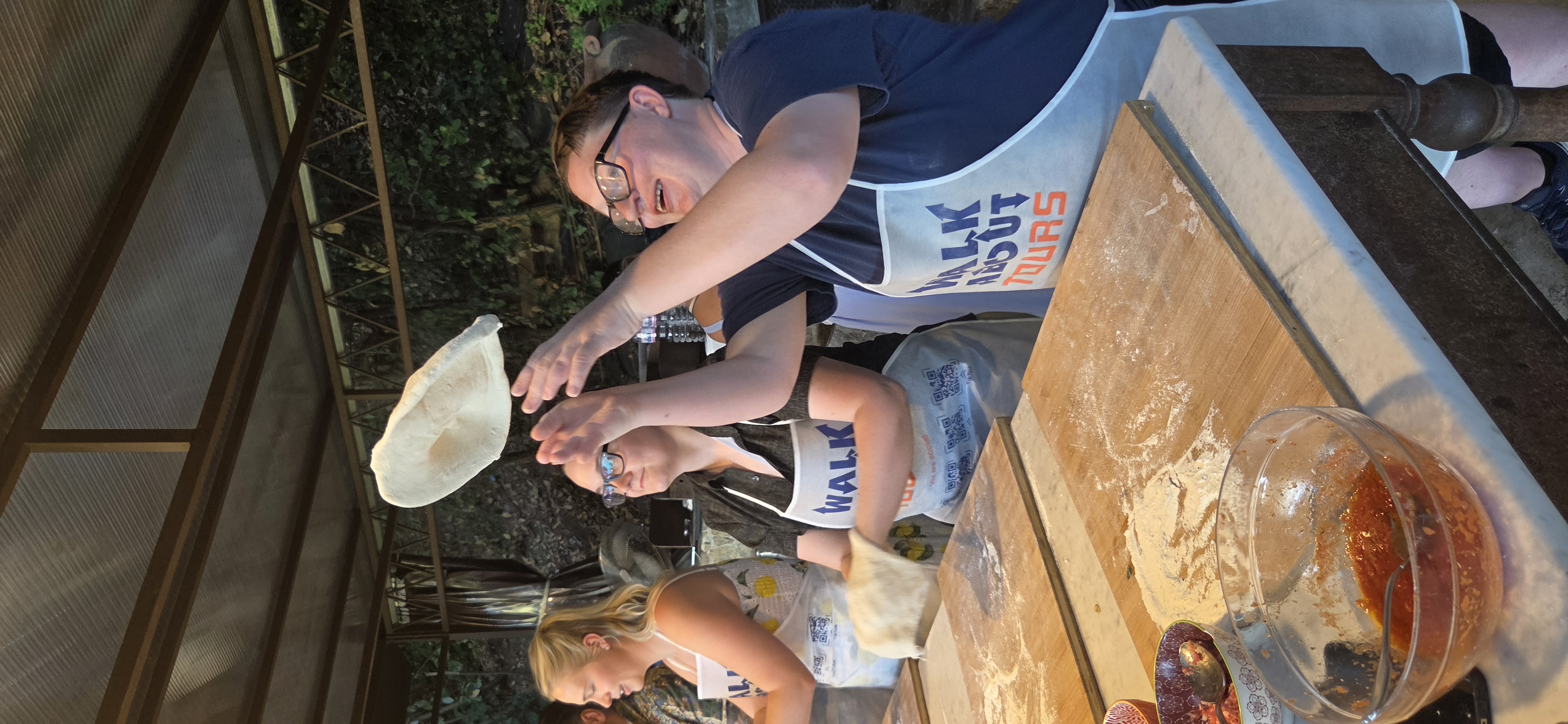 Shiloh and Jordyn preparing pizzas