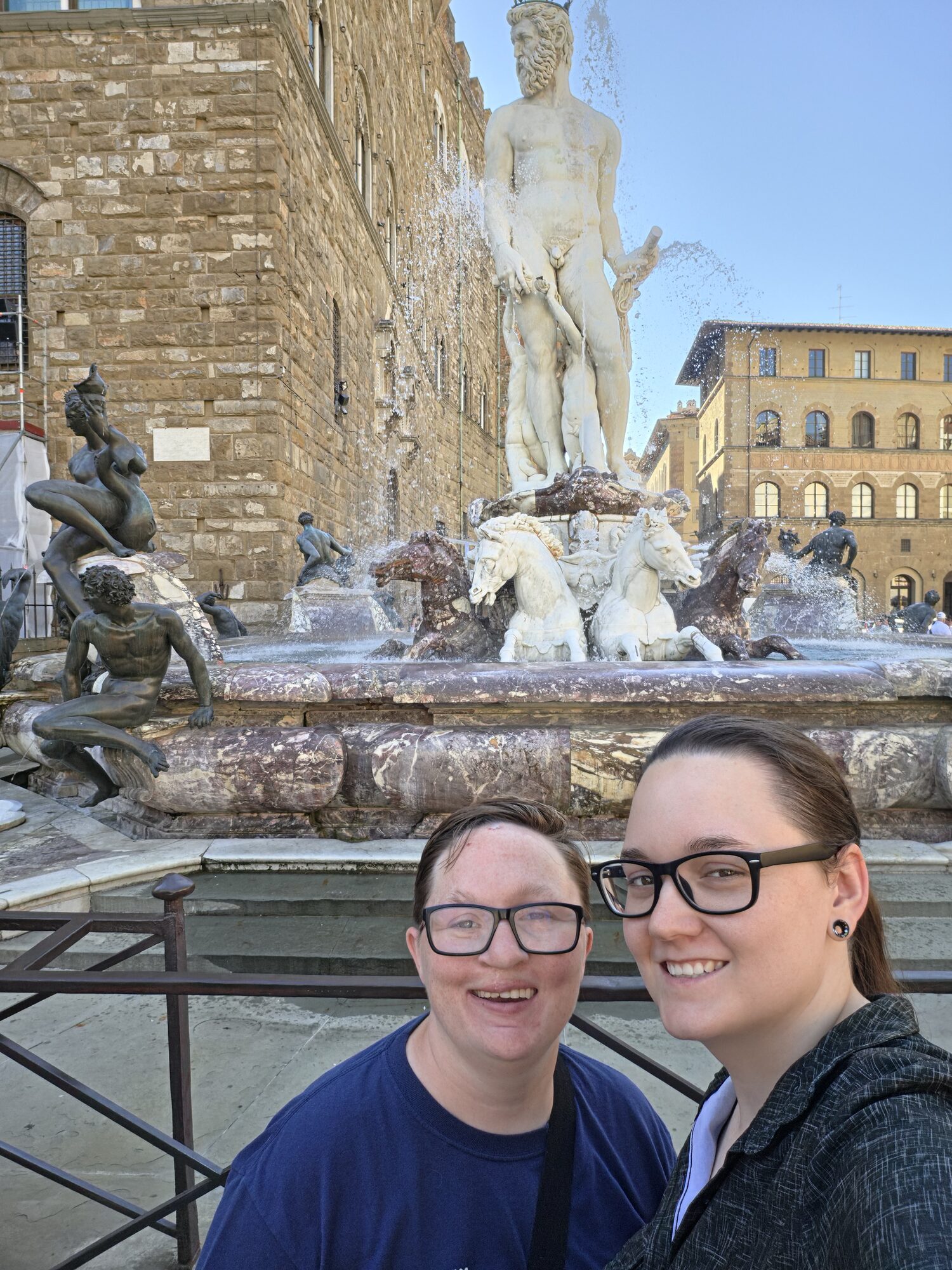 Shiloh and Jordyn by a fountain in Florence